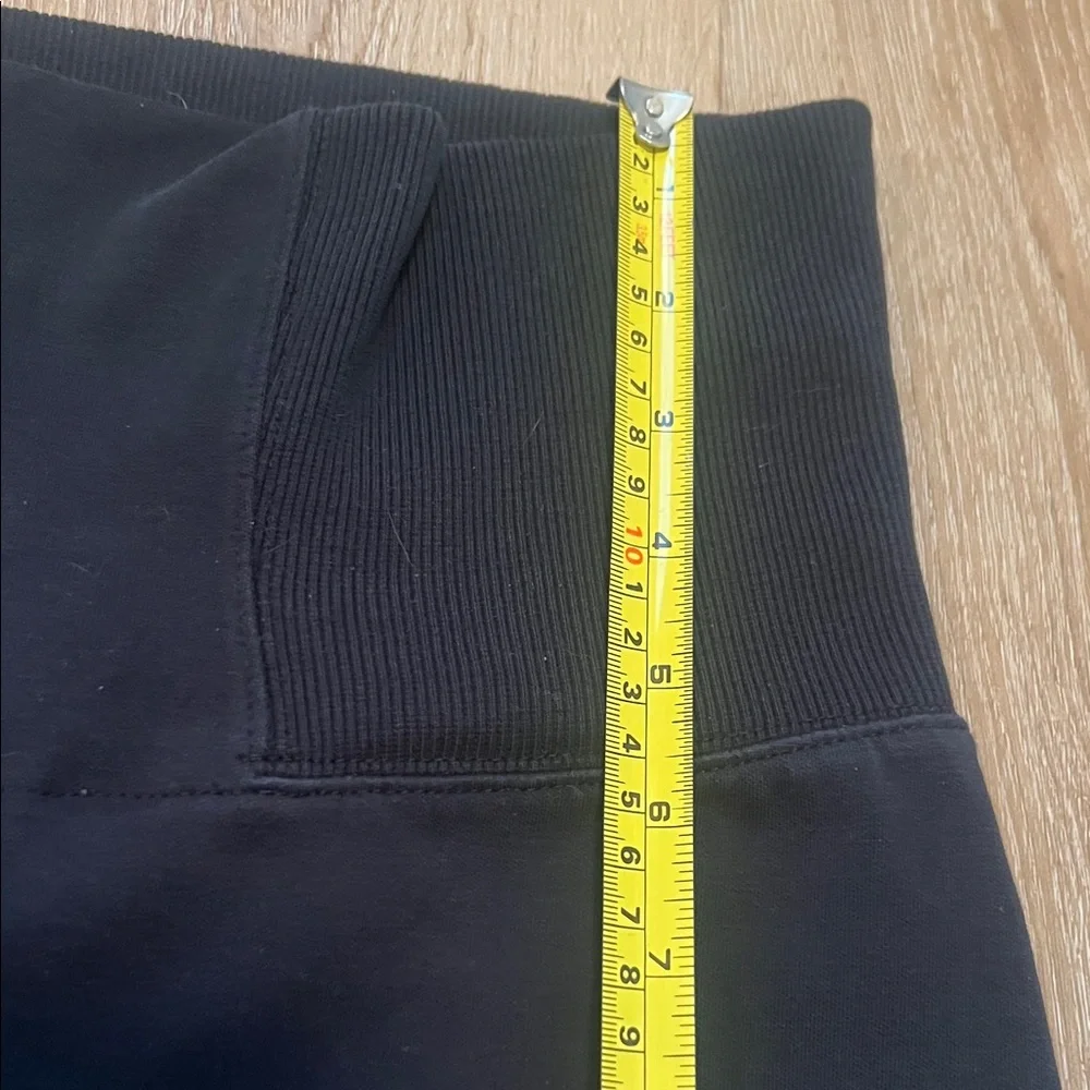 Nike Women’s front Zipper on high waist Black Joggers with White Mesh Large